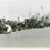 Automobiles - Ye Goode Olde Days - Men cranking cars at start of race