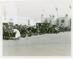 Automobiles - Ye Goode Olde Days - Men cranking cars at start of race