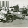 Automobiles - Ye Goode Olde Days - Man working on 1903 Orient Buckboard car