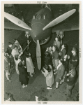 Aviation Exhibit - Children looking at Curtis P-40 Advanced Pursuit plane