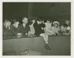 Blind people at telephone exhibit