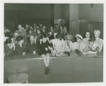 Blind people at telephone exhibit