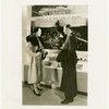 Bakelite Plastics Exhibit - Man and woman at aviation display
