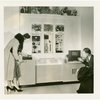 Bakelite Plastics Exhibit - Man and woman at radio display