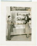 Bakelite Plastics Exhibit - Man and woman at automotive display