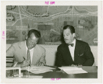 Ballantine - Carl W. Badenhausen and Grover Whalen signing contract