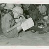 Boy Scouts - Boy writing on map