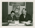 Brazil Participation - Raphael Correa de Oliveira and Grover Whalen signing contract