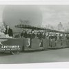 Buses - Greyhound Lines - Tractor Trains - In front of statues