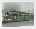 Buses - Greyhound Lines - Tractor Trains - In front of statues
