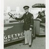 Buses - Greyhound Lines - Tractor Trains - Employee drives train