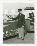 Buses - Greyhound Lines - Tractor Trains - Employee drives train
