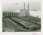 Business Systems and Insurance Building - Workers landscaping in front