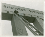 Business Systems and Insurance Building - Ladder and sign