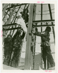 Carrier Corp. - Eskimos - Working on steel framework, close-up