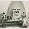 Carrier Corp. - Eskimos - Family and dogs outside of igloo