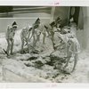 Carrier Corp. - Igloo - Exterior - Snow Girls shovel snow