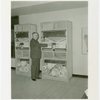 Carrier Corp. - Igloo - Interior - Man points to dial on machine