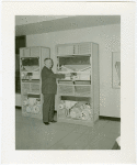 Carrier Corp. - Igloo - Interior - Man points to dial on machine