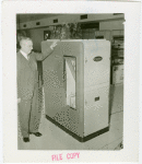 Carrier Corp. - Igloo - Interior - Man with hand on machine