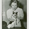 Cats - Woman holding Hitler the Cat at Jitterbug Contest