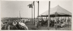 Ceremonies - Man under tent speaks to gathering