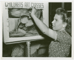 Children - Art Classes - Girl draws sign