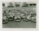 Children - Crippled Children's Outing - Children on American Express Chairs in front of Child's Restaurant