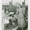 Children - Crippled Children's Outing - Boy receiving lunch from Old New York actress