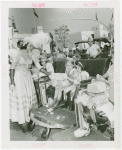 Children - Crippled Children's Outing - Girl receiving lunch from Old New York actress