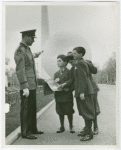 Children - School Visits - Looking at book with attendant