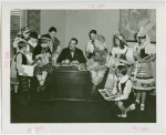 Children's World - Grover Whalen autographs copies of book