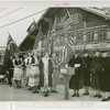 Children's World - Mrs. Herbert Hoover mails invitation while Mrs. Theodore Roosevelt Jr. and others look on in front of Girl Scout chalet.