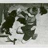 Children's World - Boy feeding bear cub