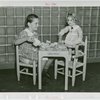 Children's World - Girl and doll at Shirley Temple's Glass Playhouse