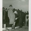 Chile Participation - Grover Whalen and C. Manuel Pereira placing box in concrete