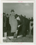 Chile Participation - Grover Whalen and C. Manuel Pereira placing box in concrete