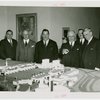 Chile Participation - Grover Whalen with others looking at model