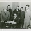 China Participation - Chinese Ambassador signing guestbook with Harvey Gibson