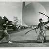 China Participation - Entertainers - Man with pole and woman with swords