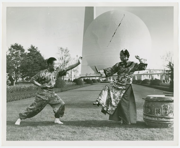 a man and woman practicing Karate