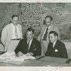 Christian Science - Grover Whalen signing contract with Christian Scientists executive committee chairman