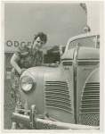 Chrysler Corp. - Woman with car