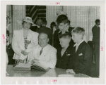 Connecticut Day - Raymond Baldwin signing guest register with family