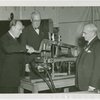 Consolidated Edison - Floyd L. Carlisle pulls switch on Edison's Dynamo, Oscar Fogg and Ralph Tapscott look on