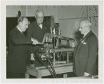 Consolidated Edison - Floyd L. Carlisle pulls switch on Edison's Dynamo, Oscar Fogg and Ralph Tapscott look on