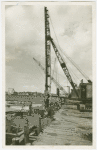Construction - Workers laying piling