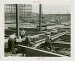 Construction - Workers laying foundation