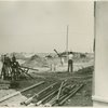 Construction - Pipes and man