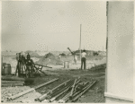 Construction - Pipes and man
